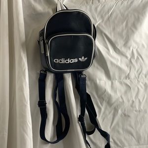 Adidas mini back pack, navy blue.